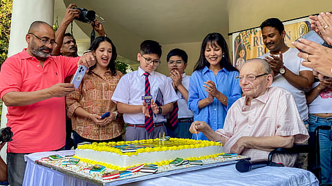 Author and poet Ruskin Bond cuts a cake during a launch of his new book All-Time Favourite Friendship Stories, in Dehradun, Uttarakhand, May 18, 2026.