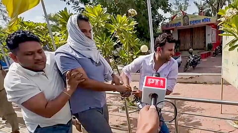 Samarth Singh, husband of model-turned-actor Twisha Sharma and an accused in her death allegedly due to dowry harassment, being taken into police custody after his appearance in a court, in Bhopal, Saturday, May 23, 2026. A court in Bhopal on Saturday remanded Singh to a seven-day police custody.
