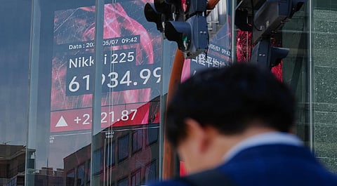Global shares gain, oil prices fall after Trump says talks on ending the war proceeding