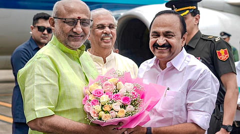 Vice President C P Radhakrishnan being received by Kerala Governor Rajendra Viswanath Arlekar and state Chief Minister VD Satheesan on his arrival, at the Cochin International Airport, in Kochi on May 31, 2026.