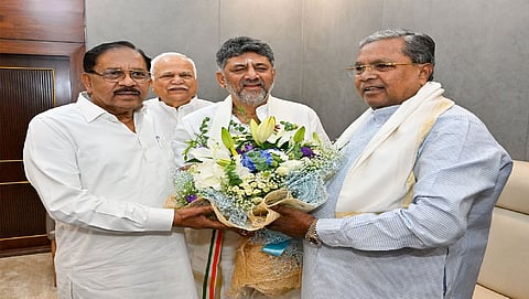 Parameshwara (L) sworn-in as minister in D K Shivakumar's Cabinet
