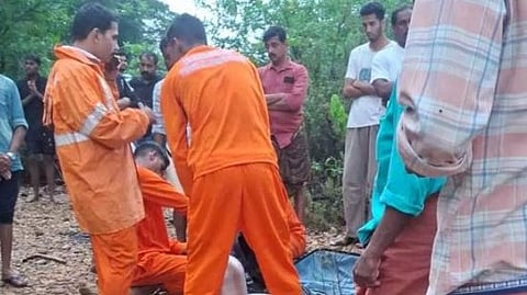 Rescue personnel making preparations for a search at Kuttiyadi river for the missing boy.
