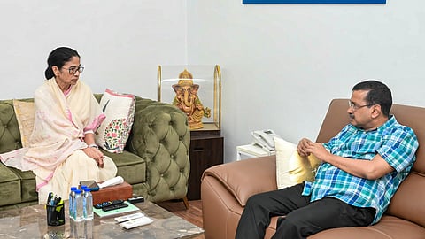 TMC supremo Mamata Banerjee interacts with AAP National Convenor Arvind Kejriwal in New Delhi on June 7, 2026.
