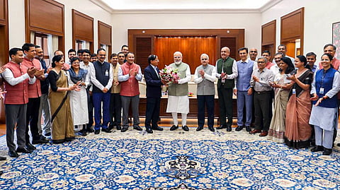 Prime Minister Narendra Modi being felicitated by Principal Secretaries to the PM Shaktikanta Das and PK Mishra and other officers of the PM's Office (PMO) on becoming the longest serving democratically elected Prime Minister of India in consecutive terms and said over the last 12 years, in New Delhi on June 10, 2026.