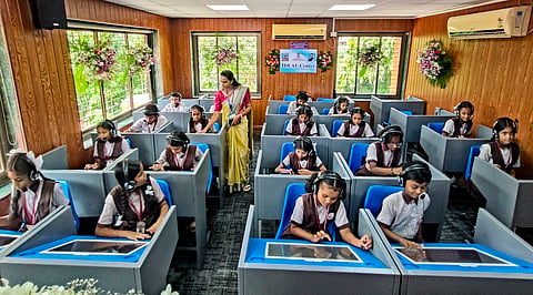 Students attend the IDEAL (Interactive Digital, Experimental, Administration and Learning) centre at PM SHRI Zilla Parishad School, on the first day as schools reopen after summer vacation, in Raigad, Maharashtra, Monday, June 15, 2026.