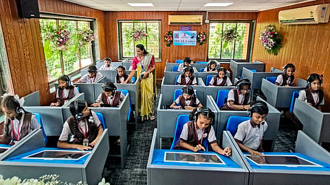 Students attend the IDEAL (Interactive Digital, Experimental, Administration and Learning) centre at PM SHRI Zilla Parishad School, on the first day as schools reopen after summer vacation, in Raigad, Maharashtra, Monday, June 15, 2026.