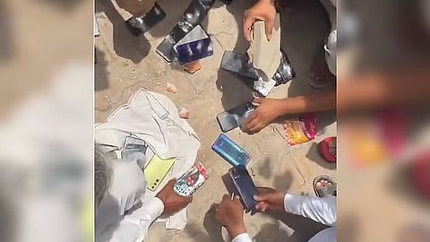 Residents smash smartphones after a panchayat resolved that no villager would use one again.