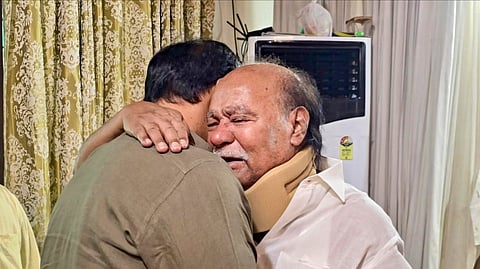 PMK founder S Ramadoss, right, embraces his son and party president Anbumani Ramadoss during a meeting at Thailapuram, near Chennai, Wednesday, June 24, 2026.