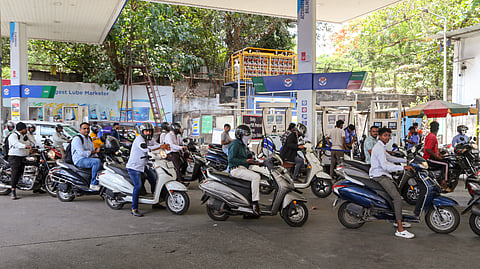 Motorists queue up to refuel their vehicles at a petrol pump amid reports of fuel shortage following a recent increase in petrol prices, in Thane, Thursday, June 18, 2026.
