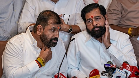 Maharashtra Deputy Chief Minister Eknath Shinde with Shiv Sena leader Sachin Ahir during a press conference after Ahir filed his nomination for the post of Deputy Chairman of the Maharashtra Legislative Council, following his induction into the Eknath Shinde-led Shiv Sena, in Mumbai, Tuesday, June 30, 2026.