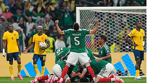 Mexico beats Ecuador 2-0 to reach the round of 16
