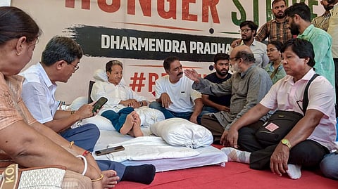 Former Kerala Finance Minister Dr Thomas Isaac and actor Prakash Raj at the gathering as Cockroach Janata Party (CJP) founder Abhijeet Dipke looks on during the ongoing protest by CJP, at Jantar Mantar, in New Delhi on July 11, 2026.