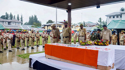 Anantnag: Police personnel pay tributes to Head Constable Ashiq Hussain during the wreath-laying ceremony for the police officer, who was killed in a terrorist attack while on Amarnath Yatra security duty, at the District Police Lines in Anantnag, Jammu and Kashmir, Wednesday, July 22, 2026.