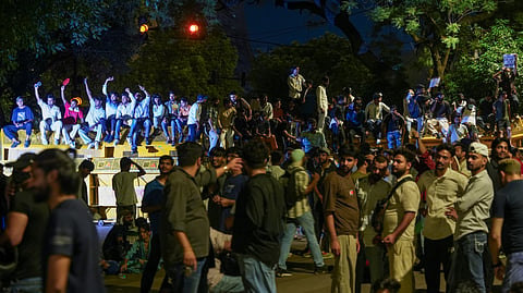 Cockroach Janata Party (CJP) supporters raise slogans during a protest at the Jantar Mantar, in New Delhi, early Thursday, July 23, 2026.