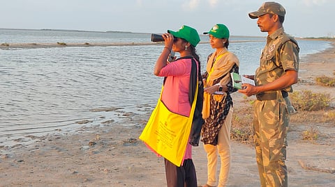 Students and forest department staff surveying the birds at Kodiyakarai in
Nagapattinam on Saturday