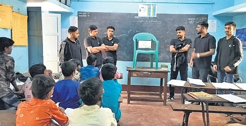 Students learn about cyber security at a government school in Tumakuru.