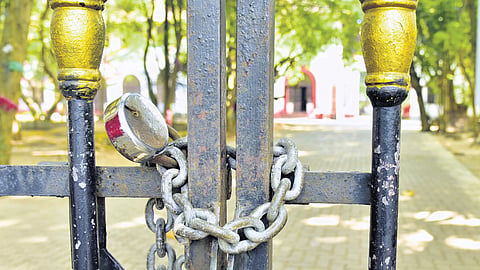 The Maharaja’s College gate locked following clashes between student political groups since Thursday.
