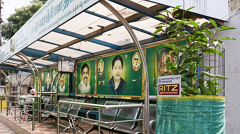 Posters defacing the bus waiting shed near K Abishekapuram zonal office in Tiruchy