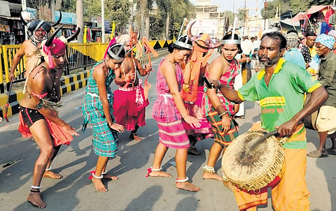 Artistes performing in the procession that marked the beginning of Dhanuyatra