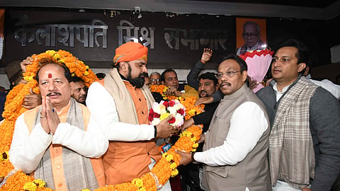 BJP National General Secretary Vinod Tawde with Bihar BJP President Samrat Choudhary (L) and party leader Vijay Kumar Sinha (R)