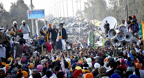 Farmers gather at the Punjab-Haryana Shambhu border during their 'Delhi Chalo' march, in Patiala district, Wednesday, Feb. 14, 2024.