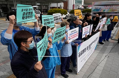 Members of The Korean Public Service and Transport Workers' Union stage a rally to demand expansion of public hospitals and medical students