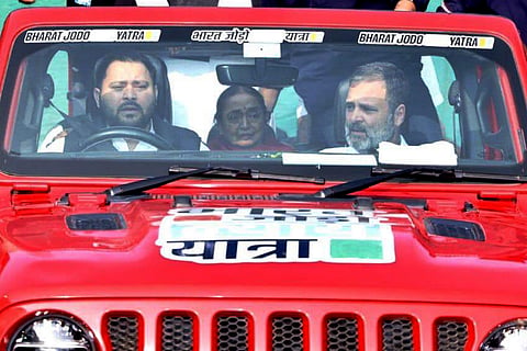 RJD leader and former Deputy Chief Minister Tejaswi Yadav drives a car carrying Congress leader Rahul Gandhi during the 'Bharat Jodo Nyay Yatra', in Sasaram district of Bihar.