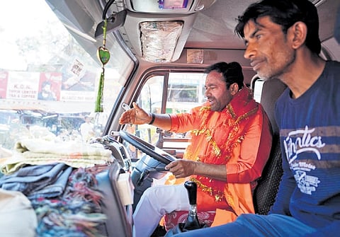 State BJP president G Kishan Reddy drives a truck after performing a special puja
at the Bhagyalakshmi temple near Charminar in Hyderabad on Monday
