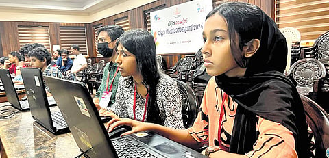 Children engrossed in coding to create 3D animations of objects at Little Kites district-level camp.
