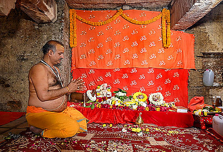 A priest performs prayers in the basement of the Gyanvapi mosque following court orders allowing the resumption of the practice (Photo | PTI)