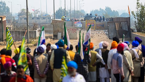 Farmers protest at the Punjab-Haryana Shambhu border during their 'Delhi Chalo' march, near Patiala district, Saturday, Feb. 17, 2024.