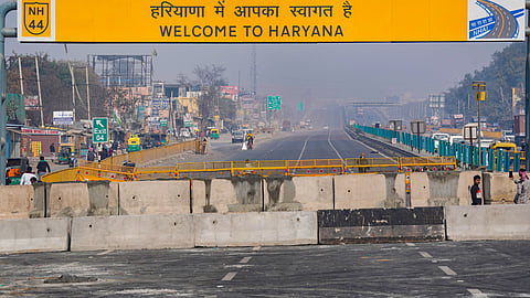 Multi-layered barricading installed near Singhu border in view of farmers' 'Delhi Chalo' march, in New Delhi, Wednesday.