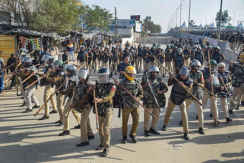 Security personnel deployed in view of farmers' 'Delhi Chalo' march, at Singhu border, in New Delhi, Wednesday, Feb. 21, 2024.
