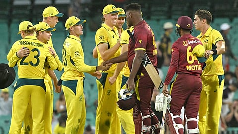 Australian players celebrate their victory in the second one-day international (ODI) cricket match against West Indies at the Sydney Cricket Ground on February 4, 2024 in Sydney.