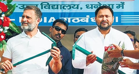 Rahul Gandhi with Tejashwi Yadav in Buxar district on February 16 | pti file
