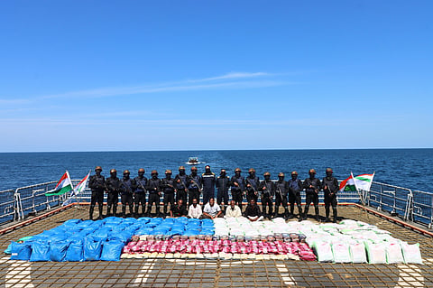 Indian Navy personnel show 3300Kgs contraband (3089kg Charas, 158kg Methamphetamine, 25kg Morphine) seized from a vessel in a joint operation with Narcotics Control Bureau.