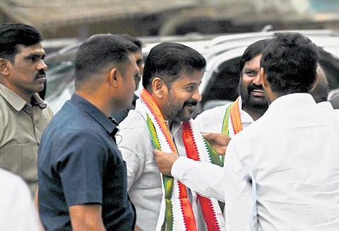 Chief Minister A Revanth Reddy arrives at the Gandhi Bhavan to attend the
Pradesh Election Committee meeting in Hyderabad on Tuesday