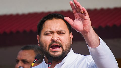 Former Bihar deputy chief minister Tejashwi Yadav addresses a public meeting during the Bharat Jodo Nyay Yatra, in Buxar district, Friday, Feb. 16, 2024.