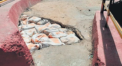 The crack filled with sand bags.