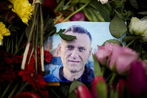 Rain drops cover a portrait of Russian opposition leader Alexei Navalny in front of the Russian Embassy in Berlin, Feb 21, 2024.