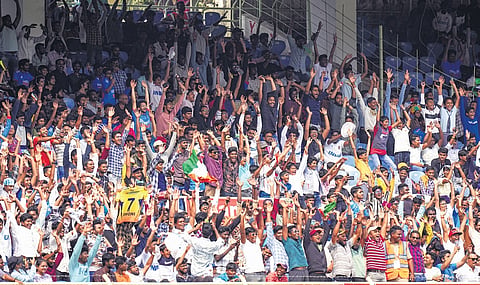 Spectators cheering for Team India during the second Test match between India and England at the Dr YS Rajasekhara Reddy ACA-VDCA Cricket Stadium in Vizag.