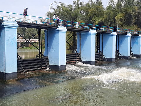 Cauvery water flowing through a regulator of River Vennar ’s distributary