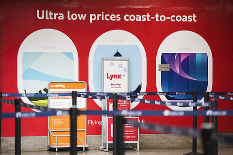 Lynx Air signage is displayed at the John C Munro Hamilton International Airport in Hamilton, Ontario, Friday, Feb 23, 2024.