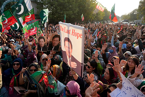 Supporters of imprisoned Pakistan's former Prime Minister Imran Khan's party chant slogans during a protest against the delaying result of parliamentary election by Pakistan Election Commission, in Karachi, Pakistan, Sunday, Feb. 11, 2024.