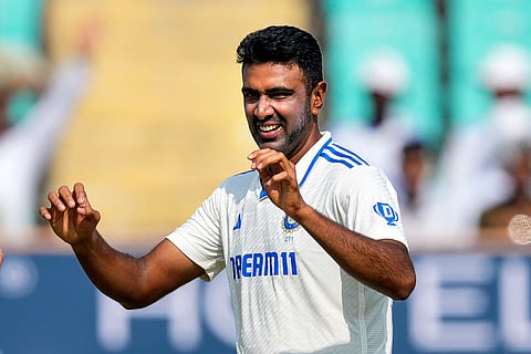 Ravichandran Ashwin celebrates the wicket of England's Zak Crawley and his 500th wicket in test cricket, on the second day of the third cricket test match between India and England in Rajkot