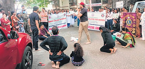 BBMP South zone officials perform a street play to create awareness on waste segregation and ban on single use plastics, in Bengaluru on Sunday