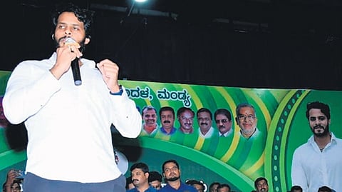 Nikhil Kumaraswamy speaks at a convention in Mandya on Friday