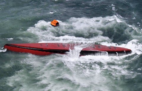 A South Korean tanker is seen capsized off Mutsure Island, Yamaguchi prefecture, southwestern Japan Wednesday, March 20, 2024.