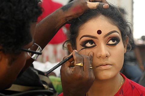 A Kerala nadanam participant gets ready for performance at the Kerala University Youth Festival in Thiruvananthapuram on Friday