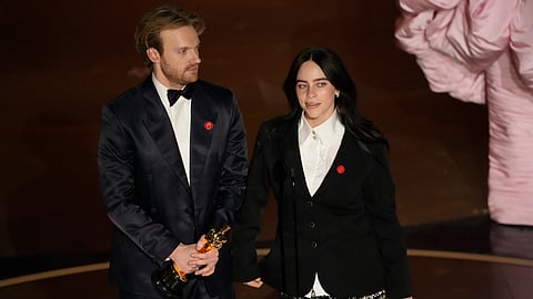 Finneas O'Connell, left, and Billie Eilish accept the award for best original song for "What Was I Made For?" from "Barbie" during the Oscars on Sunday, March 10, 2024, at the Dolby Theatre in Los Angeles.
